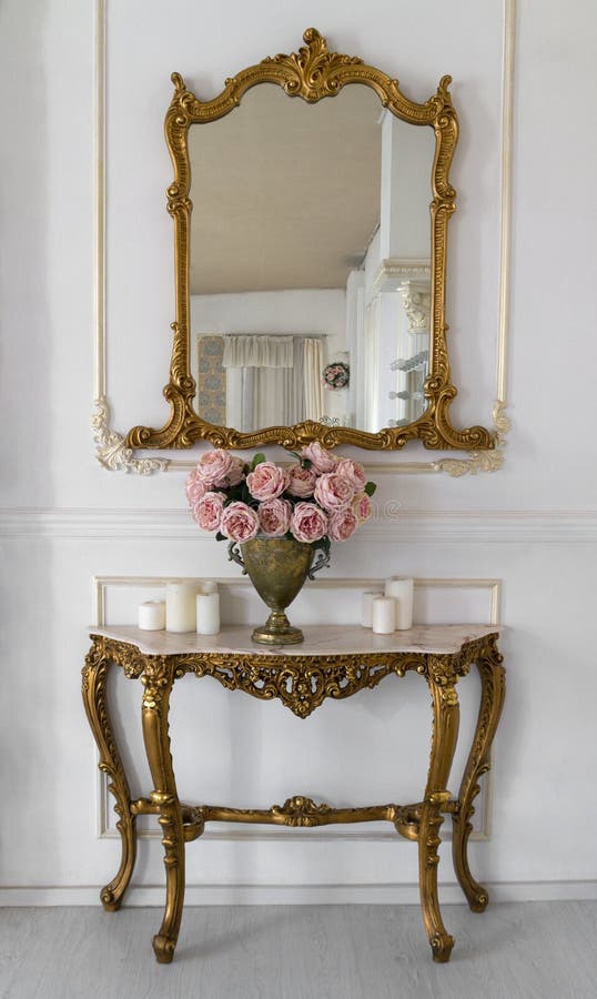 Golden vintage vanity mirror and golden table