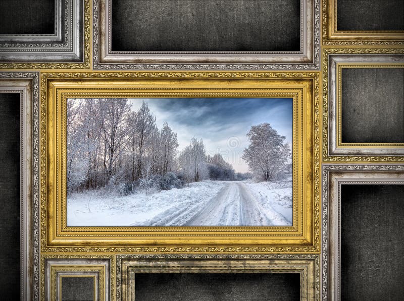 Golden wooden frame with beautiful landscape among other empty f royalty free stock images