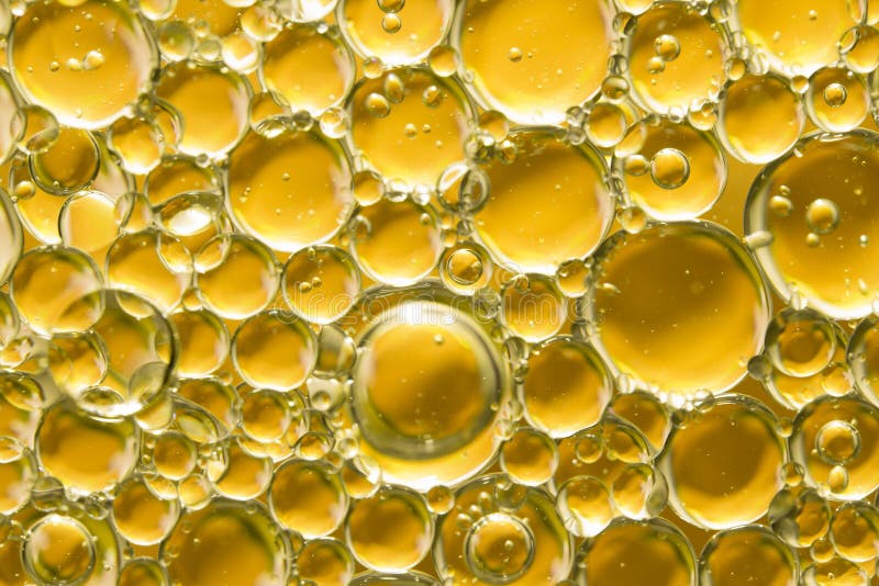 Golden yellow bubble oil stock photo. Image of laboratory 119333432