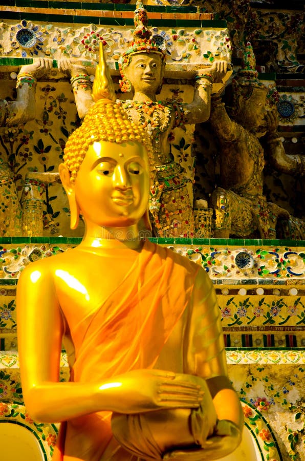 Golden Yellow Statue of Buddha Sitting Meditating and Praying Stock ...