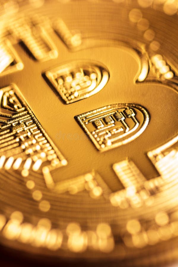 Goldener Bitcoin im Detail lizenzfreies stockbild