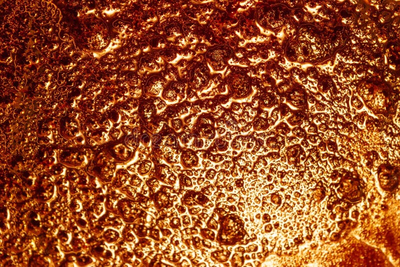 Goldene Farbe des flüssigen Glases, Hintergrundbeschaffenheit stockbild Goldene Farbe des flüssigen Glases, Hintergrundbeschaffenheit stockbild