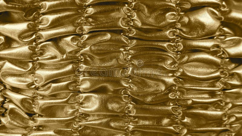 Golden shiny shirred background. Metallic texture. Golden shiny shirred background. Metallic texture