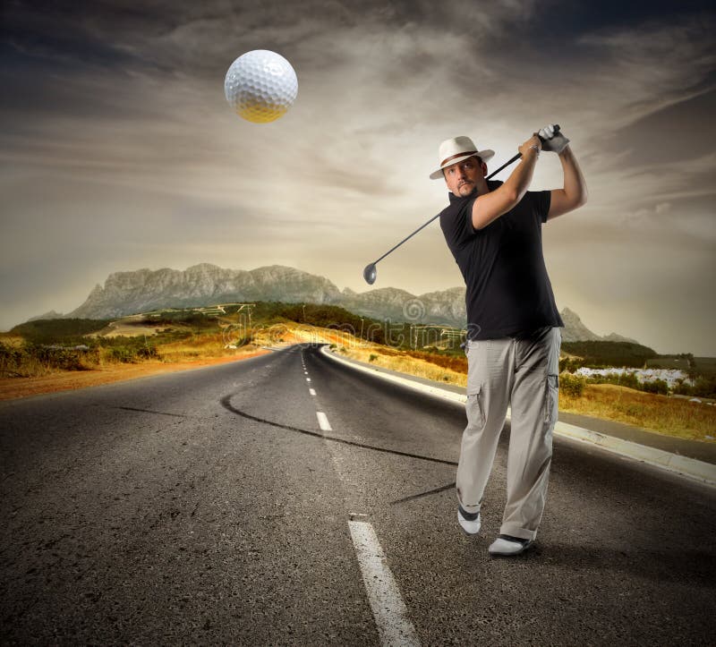 Golfer shooting a golf ballon the road