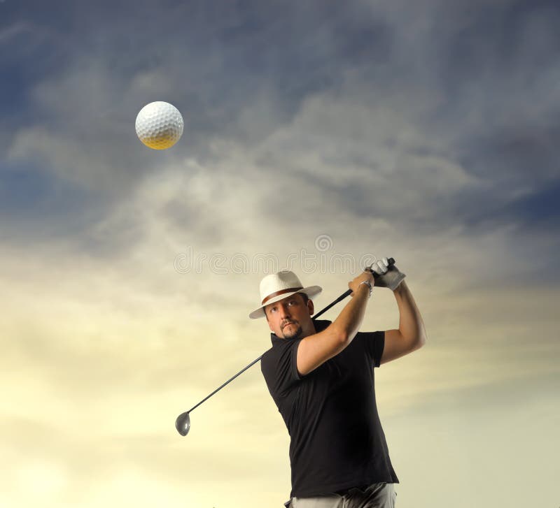 Portrait of golf player looking at flying ball