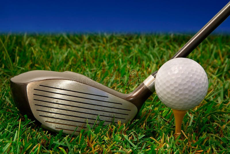 This is a close-up of a golf club and a golf ball.