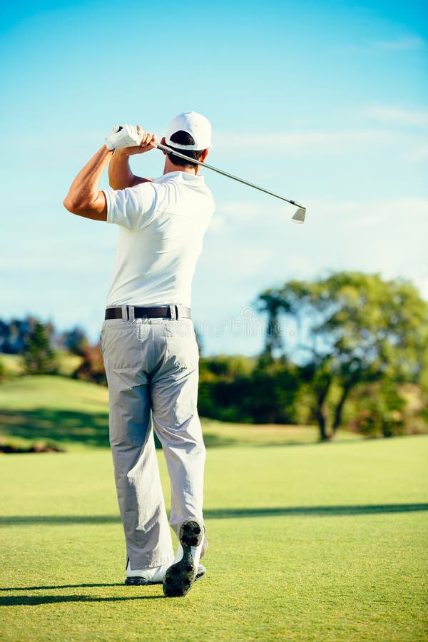 Golfer Playing on Beautiful Golf Course