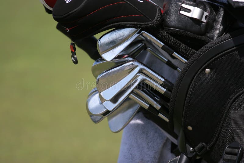Golf bag and set of clubs stock photo. Image of green 2999852