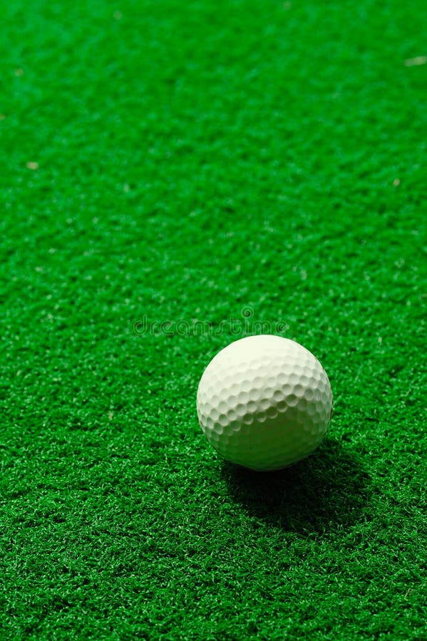 Golf ball on fake grass stock photo. Image of white, plastic 16019350