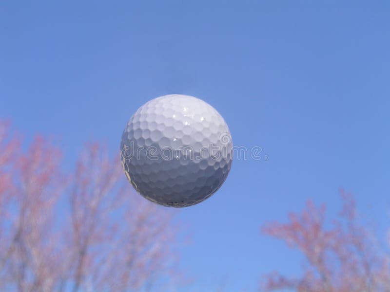 Golf Ball in Flight stock image. Image of game, golfing 104835