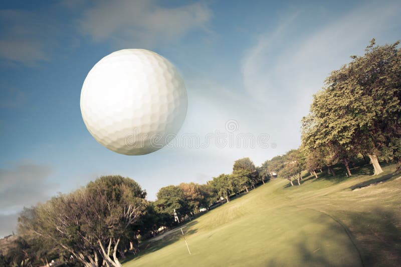 Golf ball flying over the field