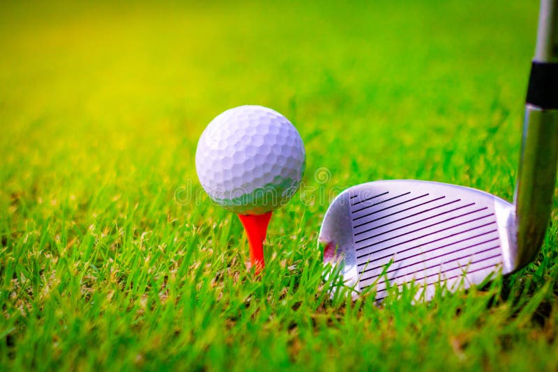 Golf ball and golf clubs on the Course. stock image Golf ball and golf clubs on the Course. stock image