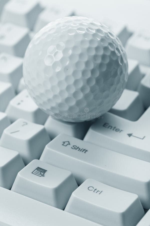 Golf Ball and Keyboard royalty free stock images Golf Ball and Keyboard royalty free stock images