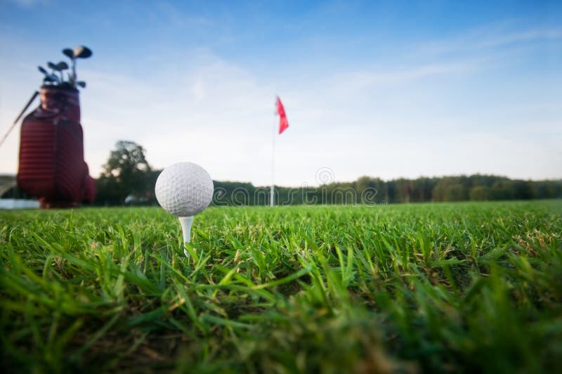 Golf ball on tee stock photos