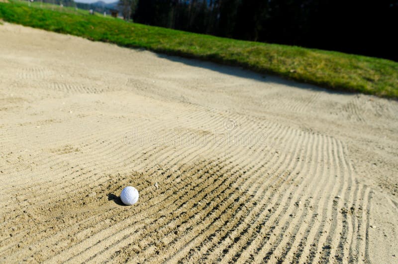 Golf Ball Trapped Sand Bunker Stock Photos Free & RoyaltyFree Stock