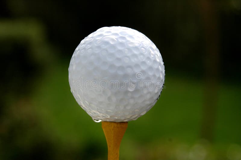 Golf - Ball on yellow tee