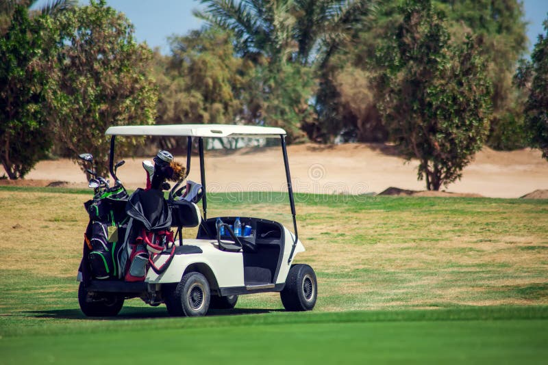 Golf Carts on the Grass Sport Field. Lifestyle and Sport Concept Stock