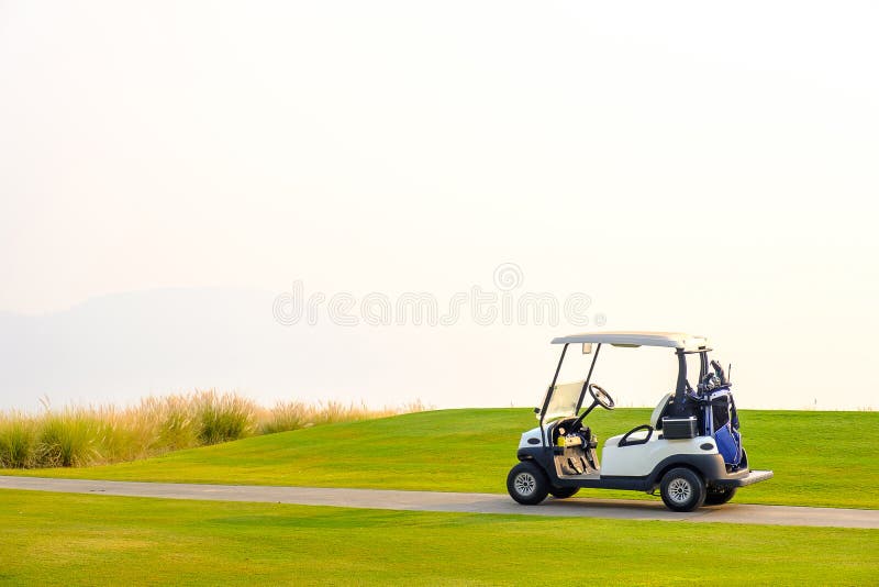 Golf carts on green yard stock image. Image of copy 177607161