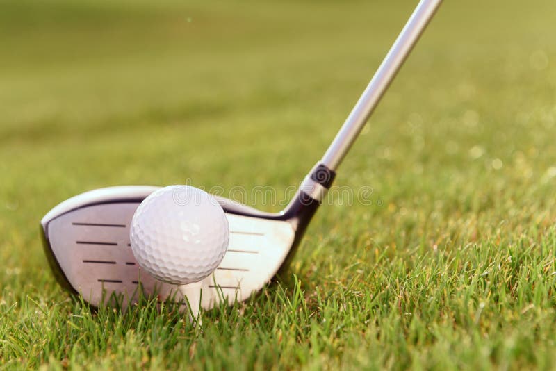 Golf club and ball on tee stock photo. Image of ball 54481360