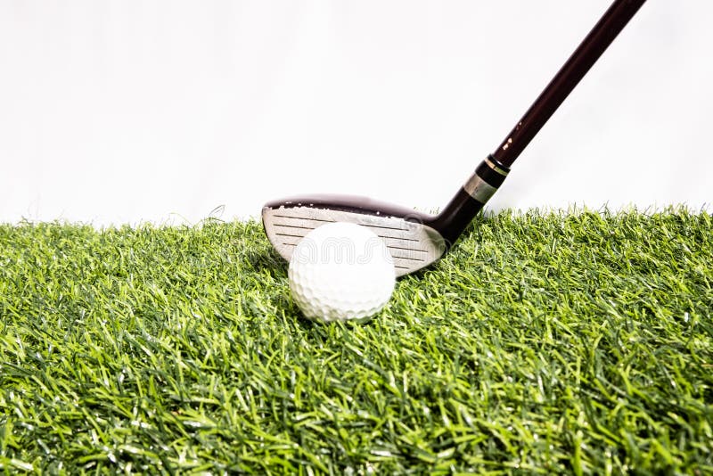 A golf club that is played by people hitting a golf ball on an artificial grass. Green means being ready for the game of golf royalty free stock photos A golf club that is played by people hitting a golf ball on an artificial grass. Green means being ready for the game of golf royalty free stock photos