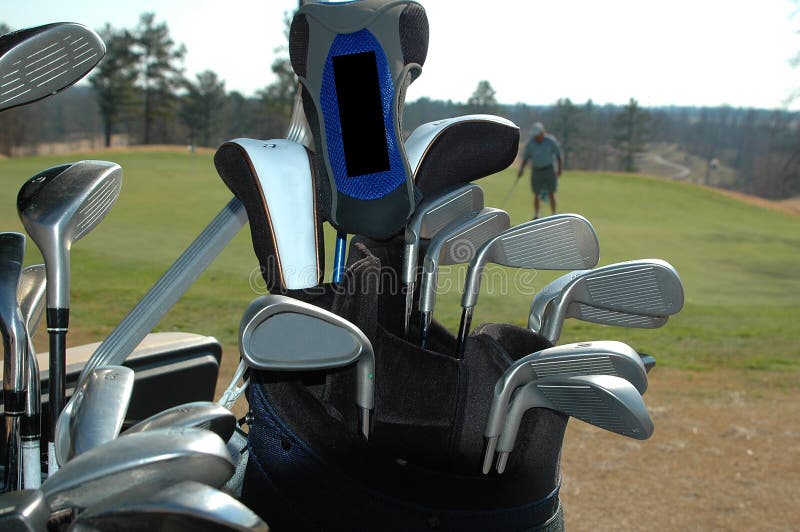 A set of golf clubs stock image. Image of grass, green 41760583