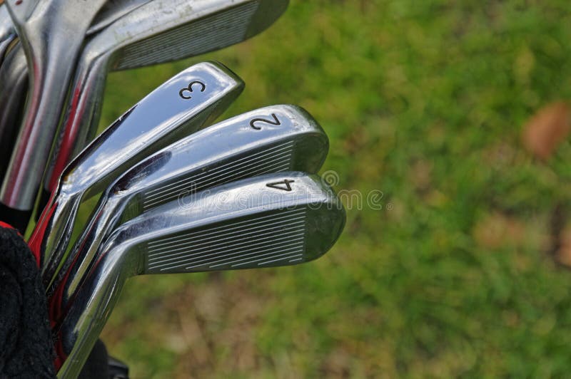 A set of golf clubs stock image. Image of grass, green 41760583