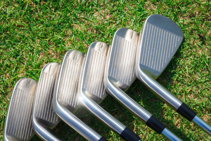 A set of golf clubs stock image. Image of grass, green 41760583