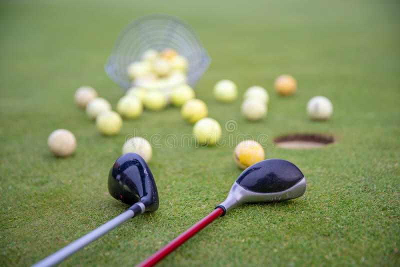 Golf Equipment on Green Golf Course, Balls and Sticks Ready To Play