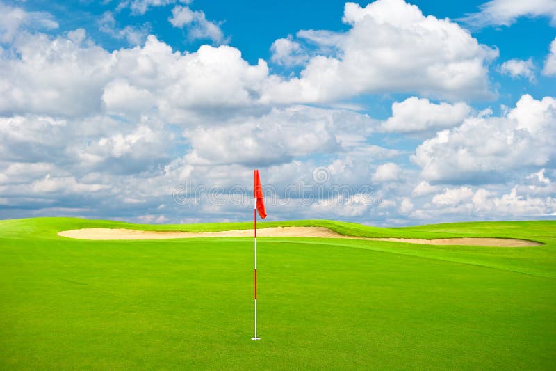 Green golf field with cloudy sky background. Day game drive stock images, royalty-free photos and pictures