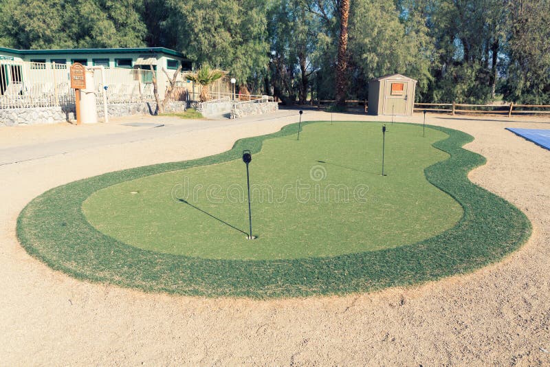 Golf Hole in Putting Green. Putting Green is a Mini Golf Course Stock