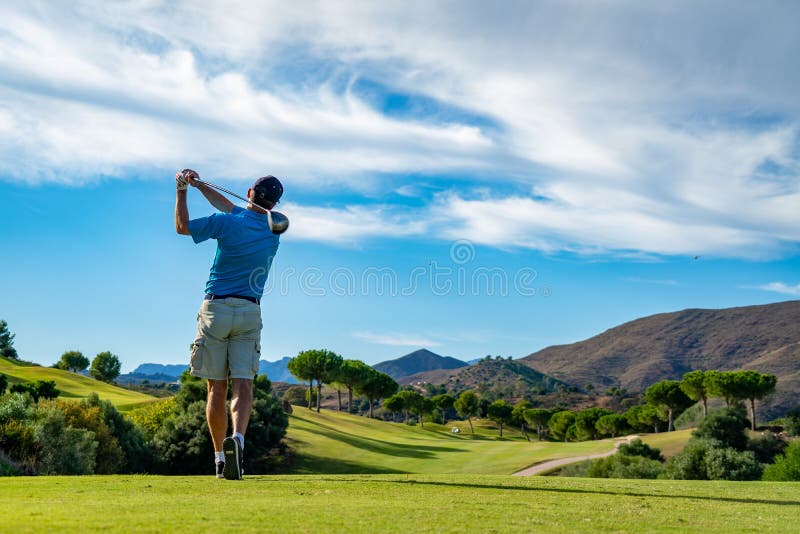 Golf at La Cala de Mijas, Spain on a sunny day with green grass and beautiful landscape.