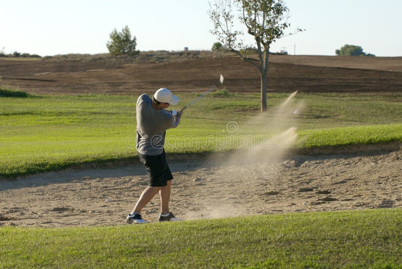 Golf player trying a shot. Day game drive stock images, royalty-free photos and pictures