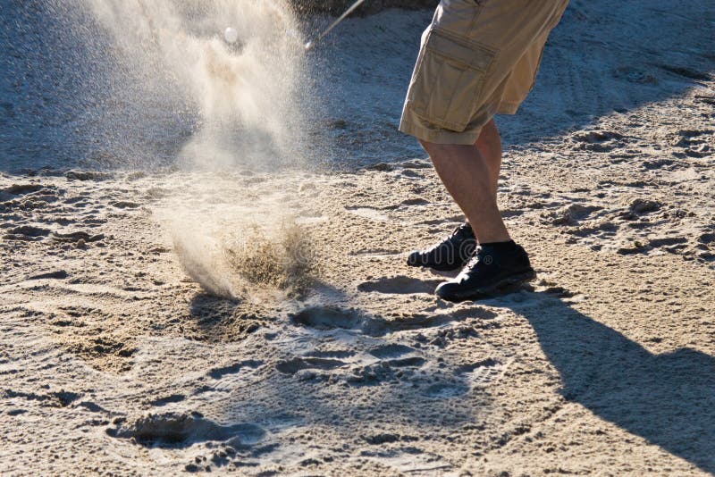 Golf Player Hitting the Ball from the Sand Bunker Stock Photo Image