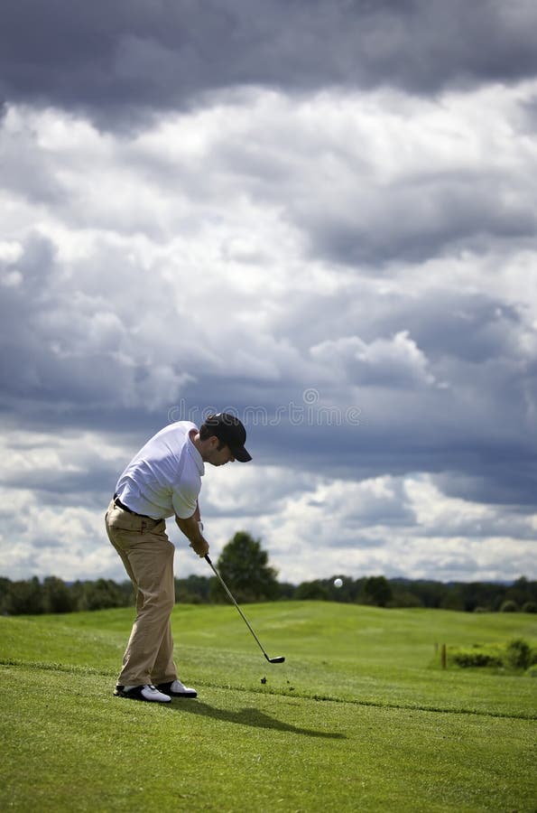Golf player pitching stock photo. Image of ball, club 14448904