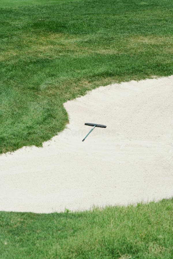 Golf rake in a sand trap stock photo. Image of trap, sport 6268756
