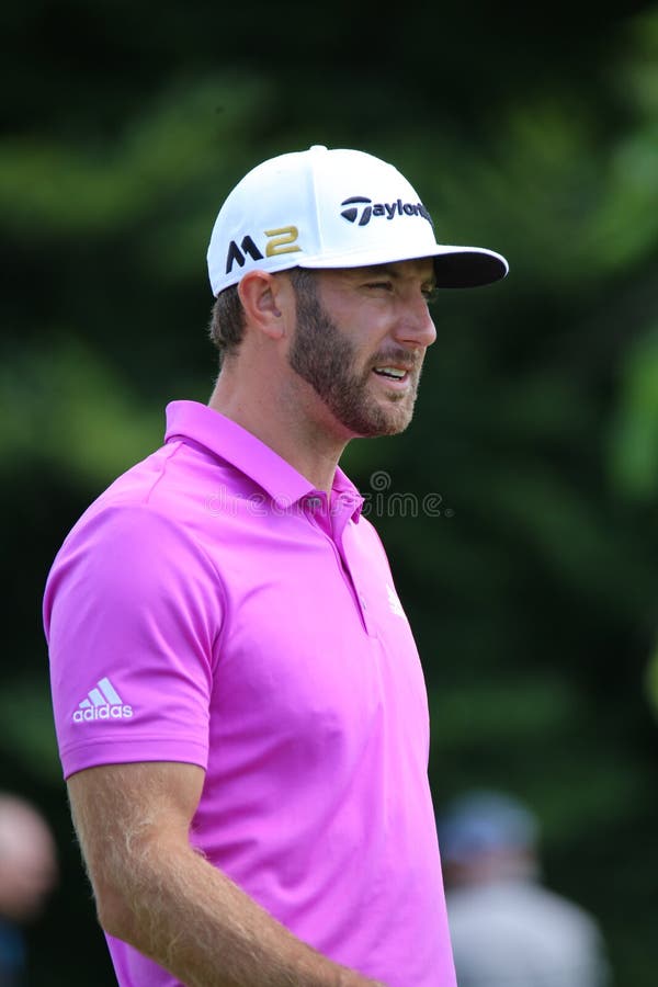 American Dustin Johnson prepares to tee off at the PGA professional golf event, WGC - Bridgestone Invitational, World Golf Championship, Firestone Country Club, Akron, Ohio, United States. American Dustin Johnson prepares to tee off at the PGA professional golf event, WGC - Bridgestone Invitational, World Golf Championship, Firestone Country Club, Akron, Ohio, United States