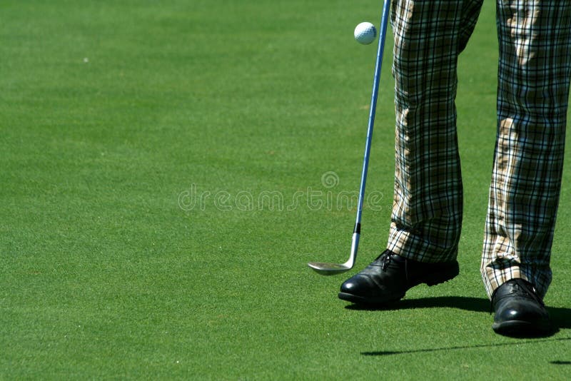 Golfer Juggling a Golf Ball with Retro Pants Stock Photo Image of