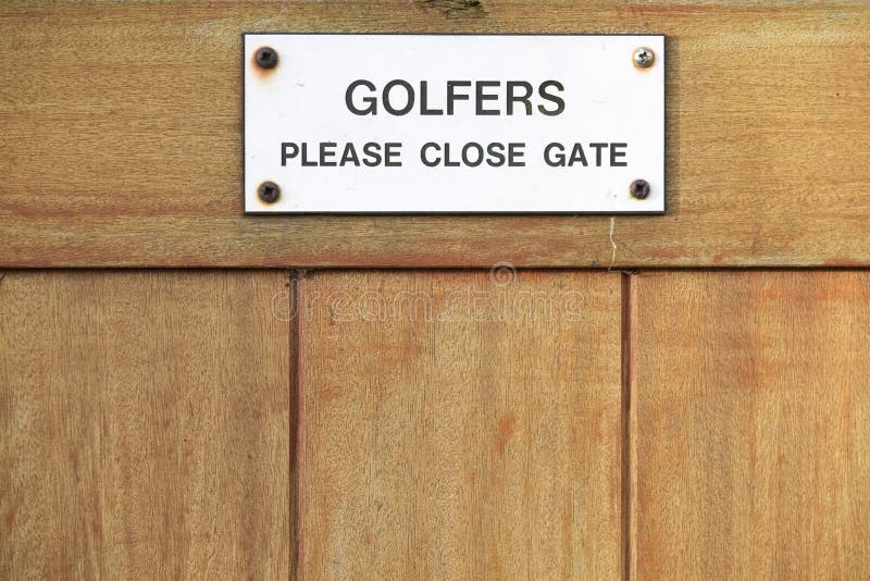 Golfers please close gate sign on golf course club house stock images Golfers please close gate sign on golf course club house stock images