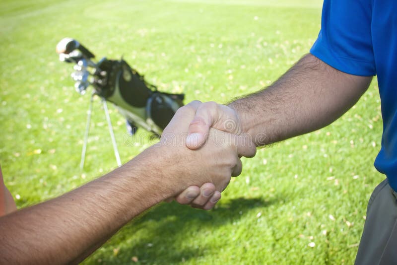Golfers Shaking Hands stock image. Image of competition 17920057