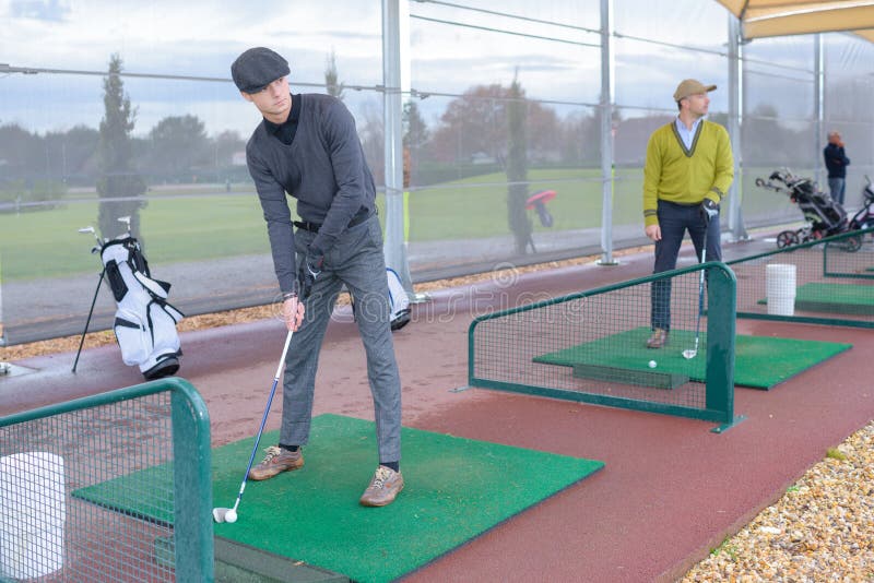 Golfers in Training Indoors Stock Photo Image of beautiful, club