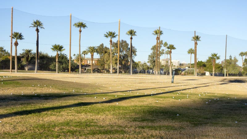 Golf Course Field Golf course white balls spread all over grass in Encanto park, Phoenix downtown, Arizona in Winter. Golf Course Field Golf course white balls spread all over grass in Encanto park, Phoenix downtown, Arizona in Winter.