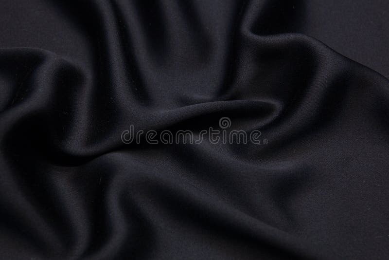 Golvende de textuurachtergrond van de stoffenclose-up royalty-vrije stock afbeeldingen Golvende de textuurachtergrond van de stoffenclose-up royalty-vrije stock afbeeldingen