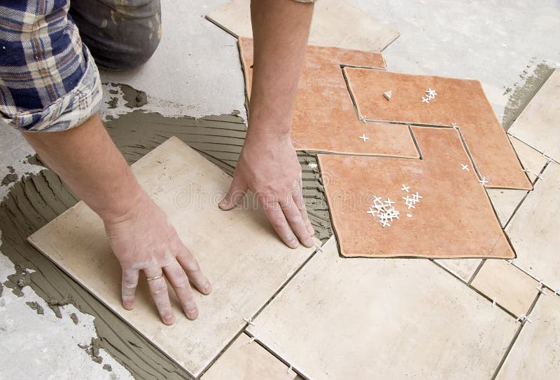 golvinstallationstegelplattor royaltyfri bild golvinstallationstegelplattor royaltyfri bild