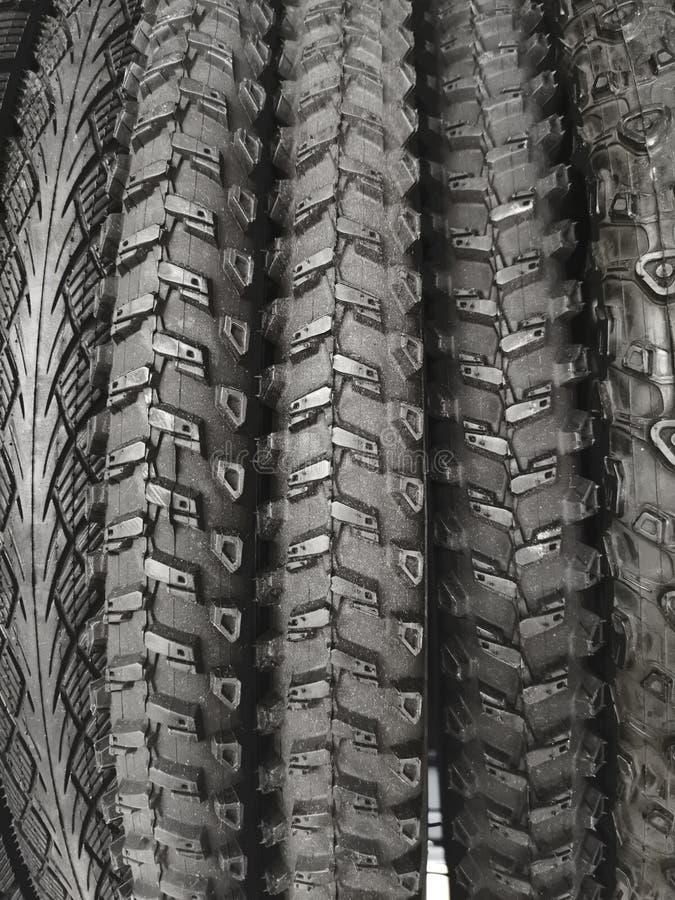 Gomme della bicicletta, primo piano fotografia stock libera da diritti Gomme della bicicletta, primo piano fotografia stock libera da diritti