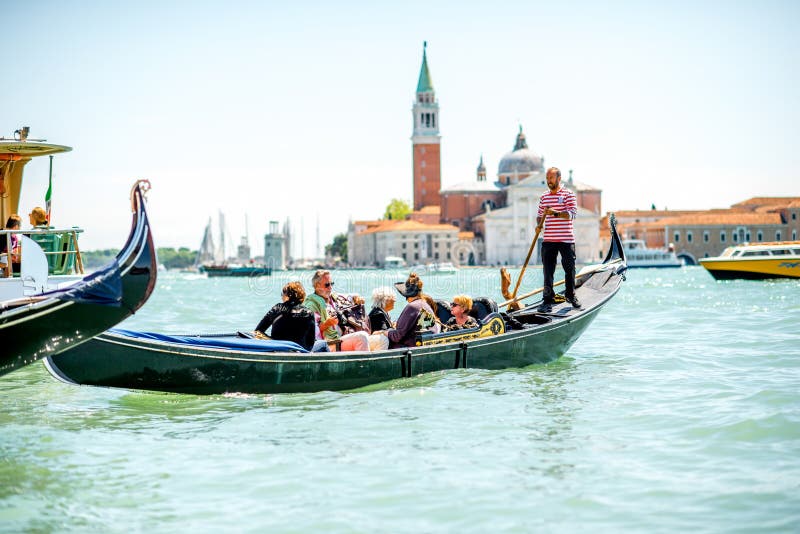 Gondolas in Venice editorial image. Image of traditional - 76286975
