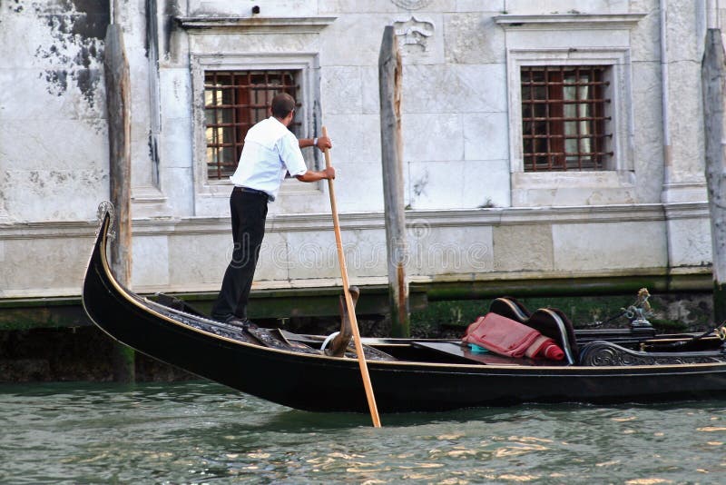 Gondolier rowing