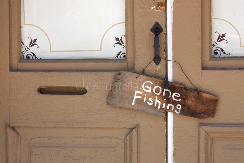 Gone Fishing Sign on old Country Store front door