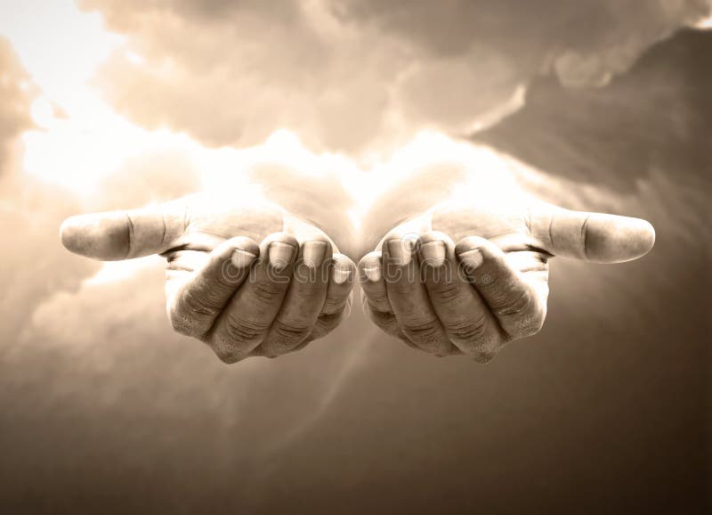 Jesus Christ open empty hands with palm up stock photos