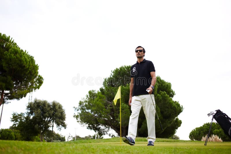 Good golf game at sunny summer day on the course stock image Good golf game at sunny summer day on the course stock image