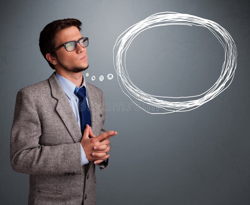Good-looking man thinking about speech or thought bubble with co royalty free stock image Good-looking man thinking about speech or thought bubble with co royalty free stock image